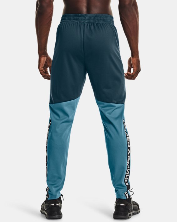 Men's UA Tricot Track Pants in Blue image number 1